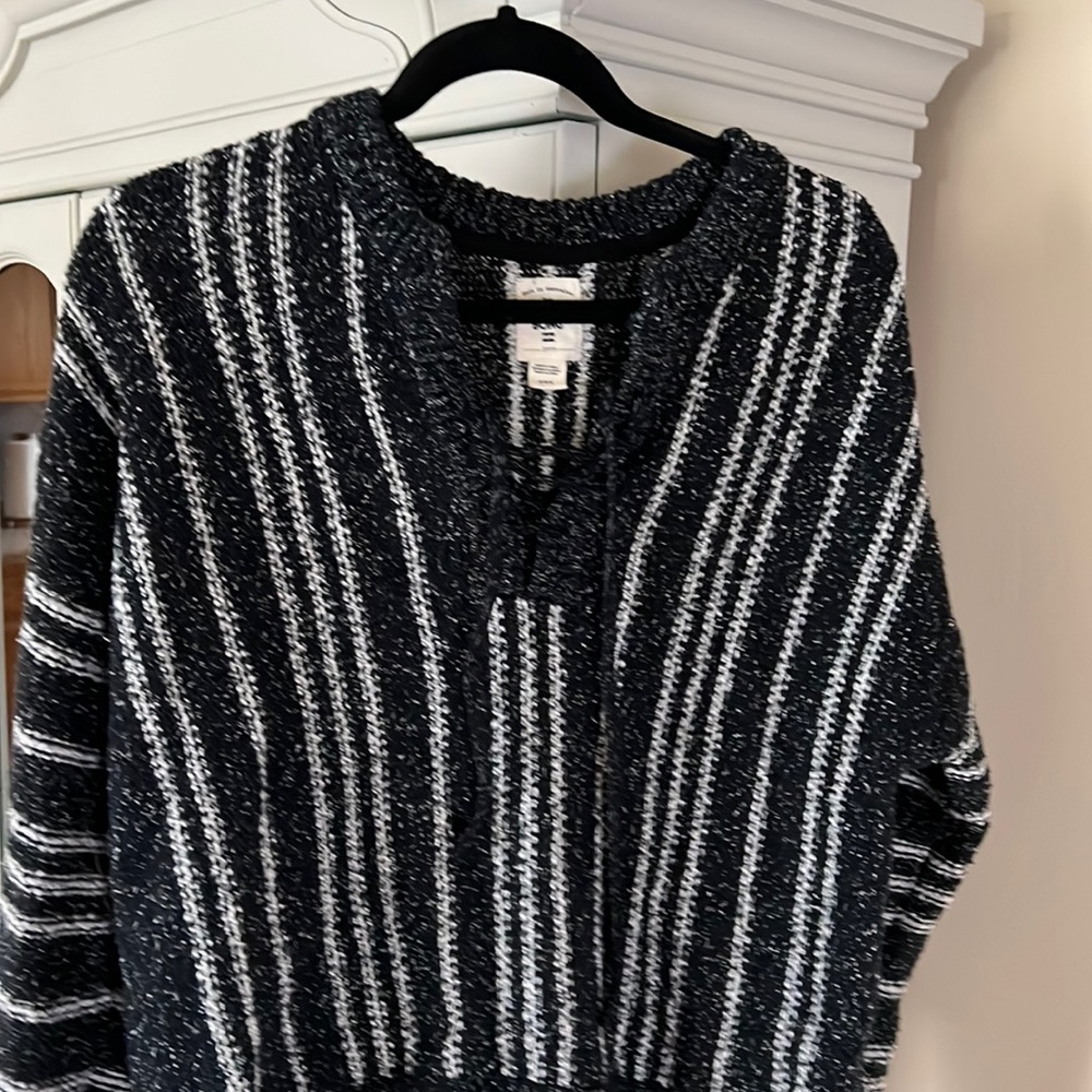 Super cute BillaBong sweater in a size medium.